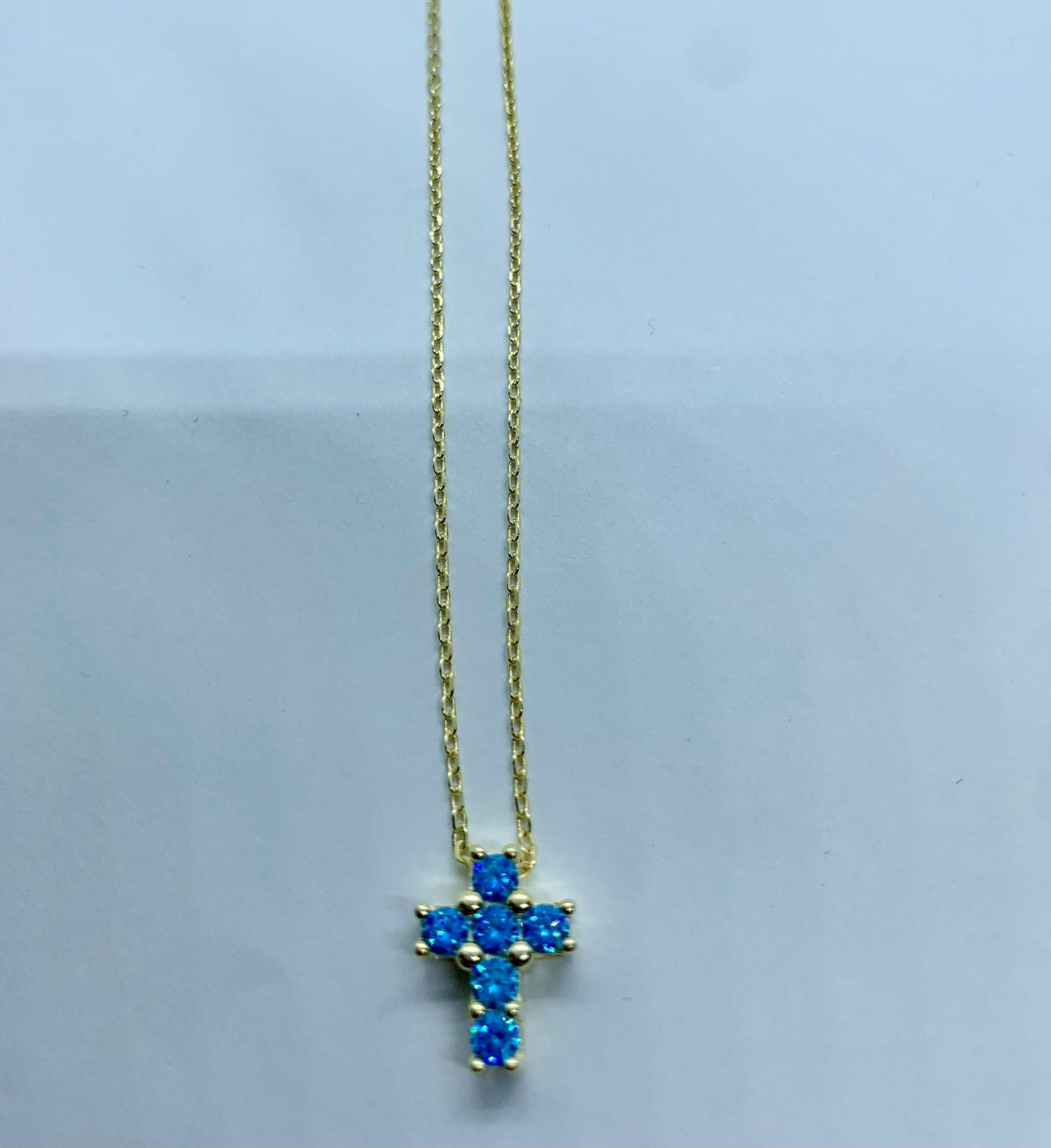 Collana con croce blu